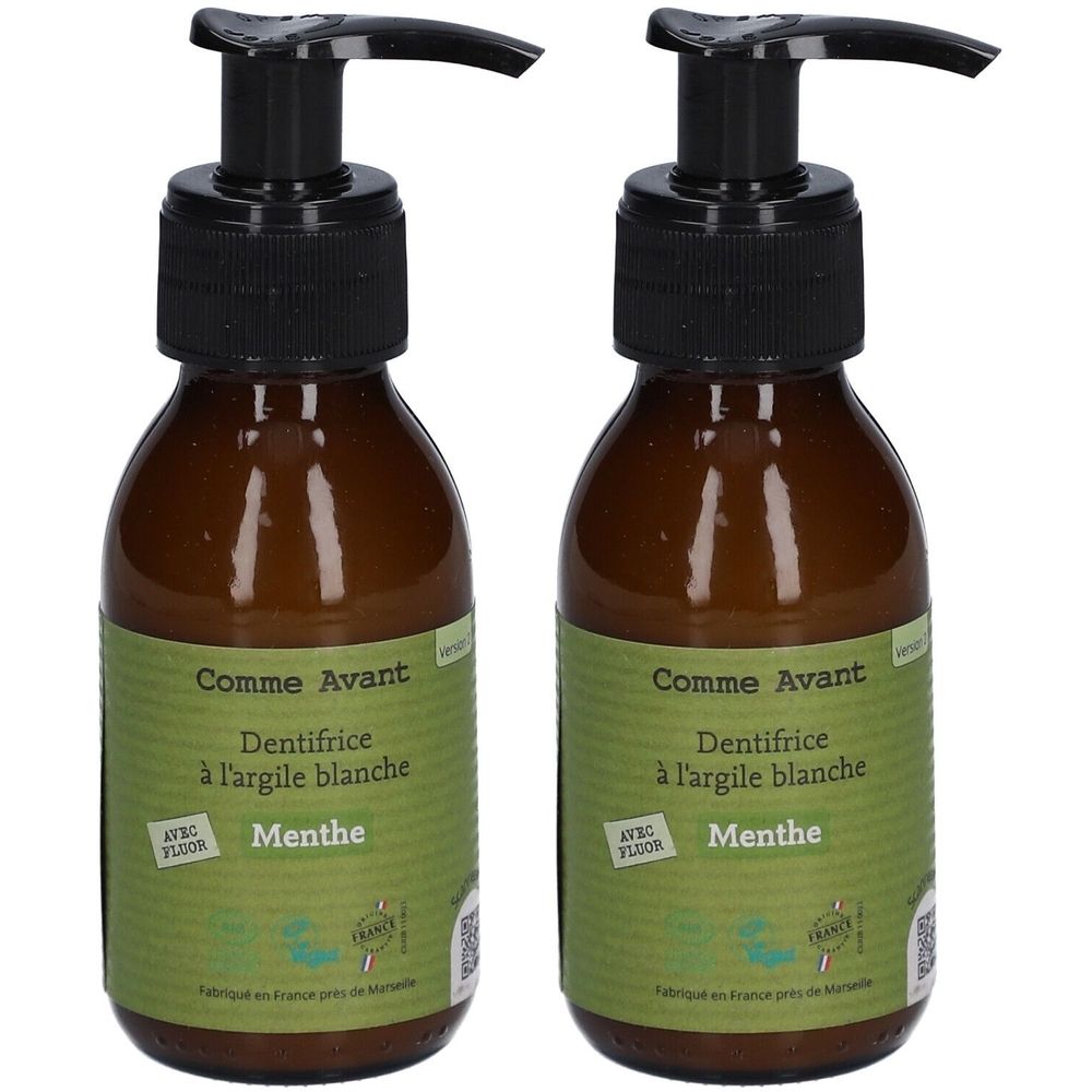 Twee bruine flessen met zwarte pomp. Opschrift: Comme Avant, Dentifrice à l'argile blanche, Menthe. Groene etiketten.