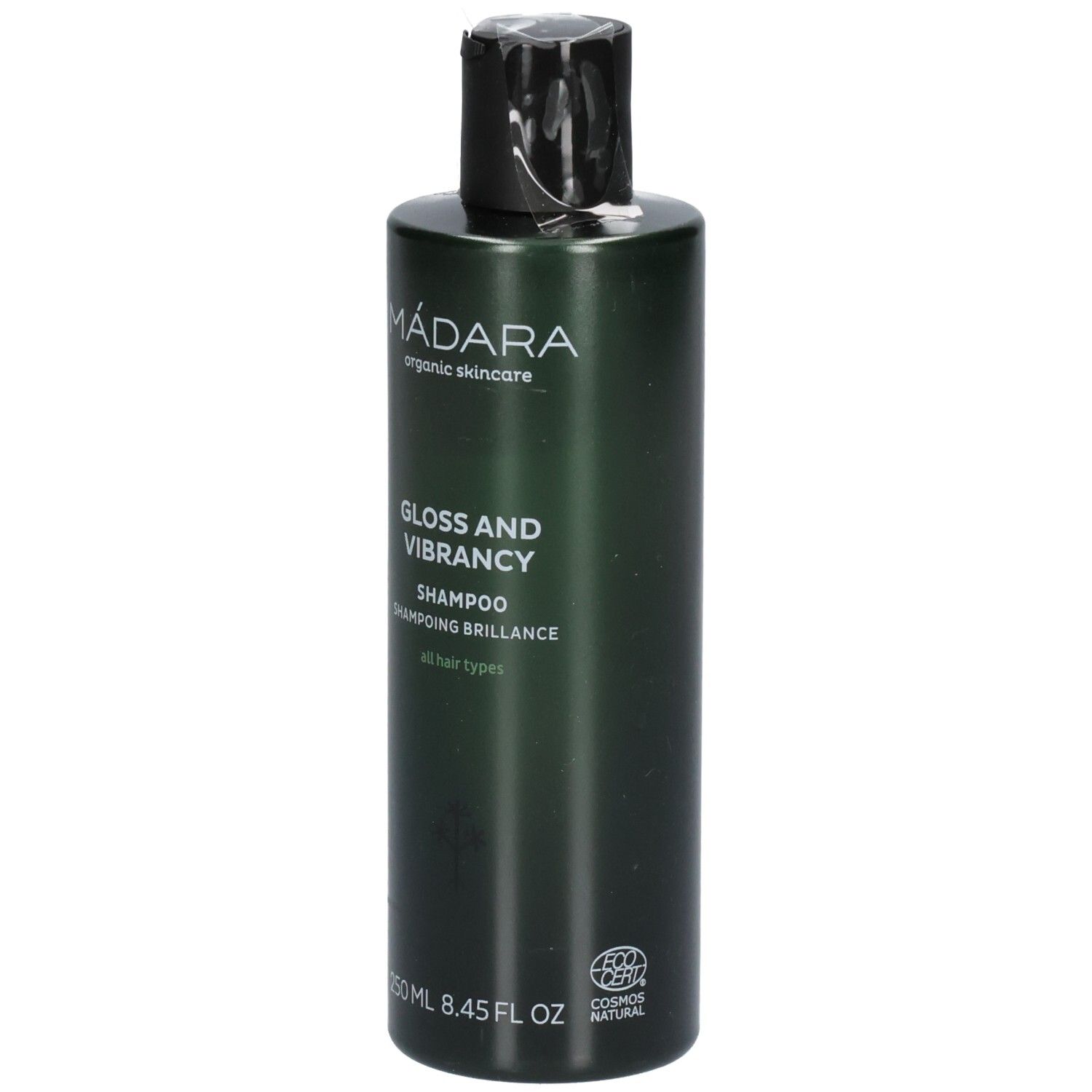 Groene shampoofles met zwarte dop. Etiket: MÁDARA, Gloss and Vibrancy Shampoo, 250 ml.
