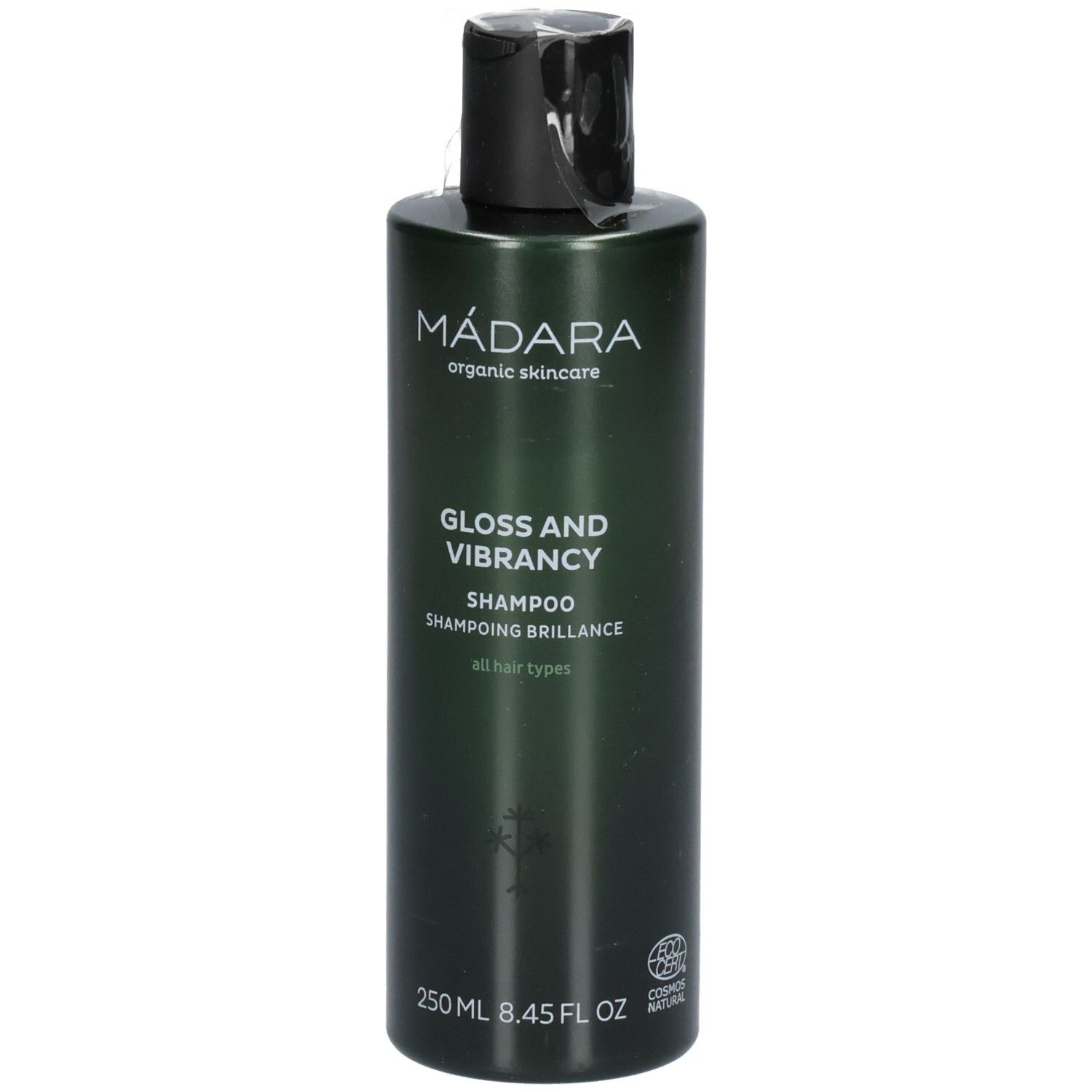 Groene shampoofles met zwarte dop. Etiket: MÁDARA, Gloss and Vibrancy Shampoo, 250 ml.
