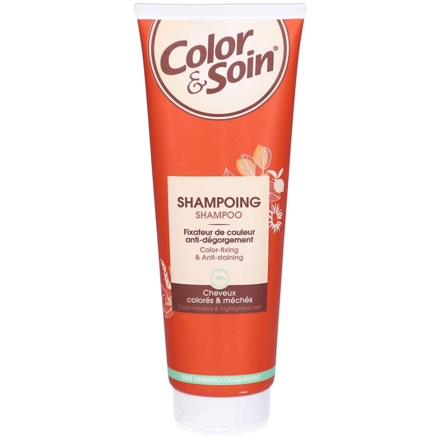 Oranje tube met witte dop. Opschrift "Color & Soin" en "Shampoo". 
