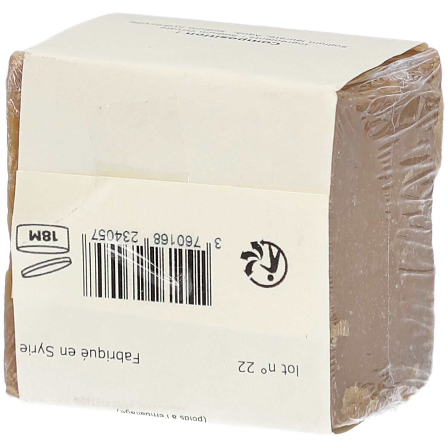 Zeepblok in papier en plastic folie. Achterkant met barcode, productie- en recyclingsymbolen. Gemaakt in Syrië.