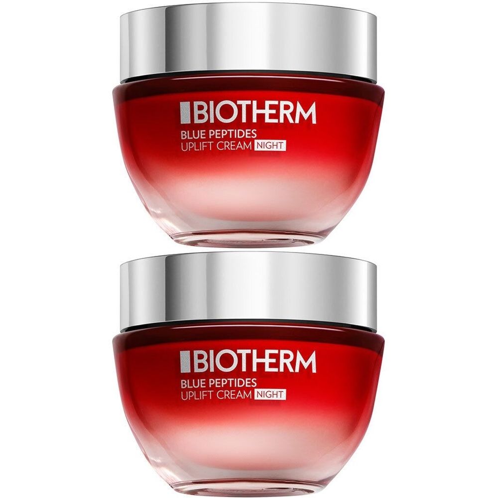 Twee potten BIOTHERM Blue Peptides Crème Nuit. Rode kleurovergang, zilveren deksel. Opschrift BIOTHERM, Blue Peptides, Uplift Cream Night.