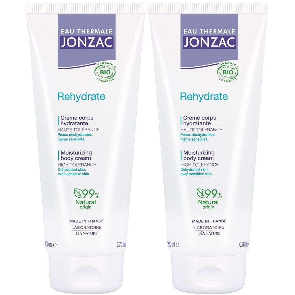 Twee witte tubes met blauwe tekst. Opschrift: Jonzac Rehydrate, hydraterende crème, 99% natuurlijke oorsprong, bio-certificering.