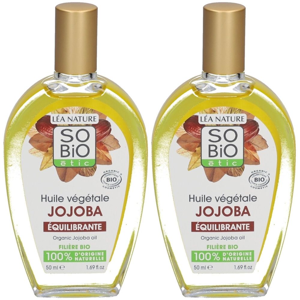 Deux flacons d'huile de Jojoba SO BIO ETIC. Flacons ovales transparents avec bouchons dorés. Étiquette avec logo, nom du produit et label bio.
