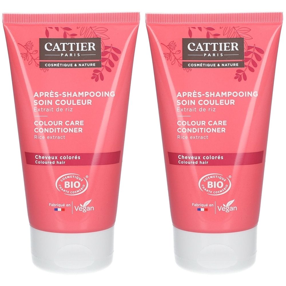 Twee roze tubes haarconditioner. Opschrift: CATTIER PARIS, Après-Shampooing Soin Couleur, Colour Care Conditioner. Bio-certificering.