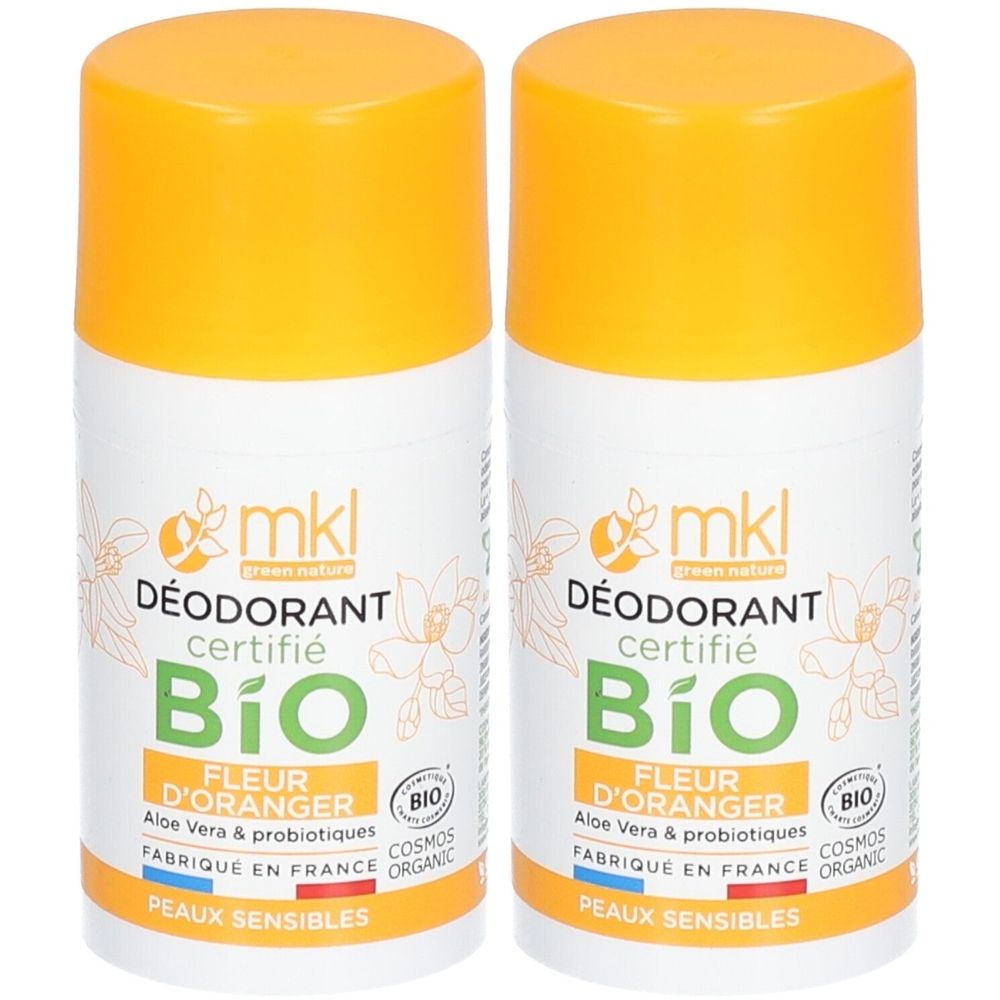 Deux déodorants avec bouchons jaunes. Inscription: mkl, BIO, Fleur d'Oranger, Aloe Vera, probiotiques, Peaux sensibles.