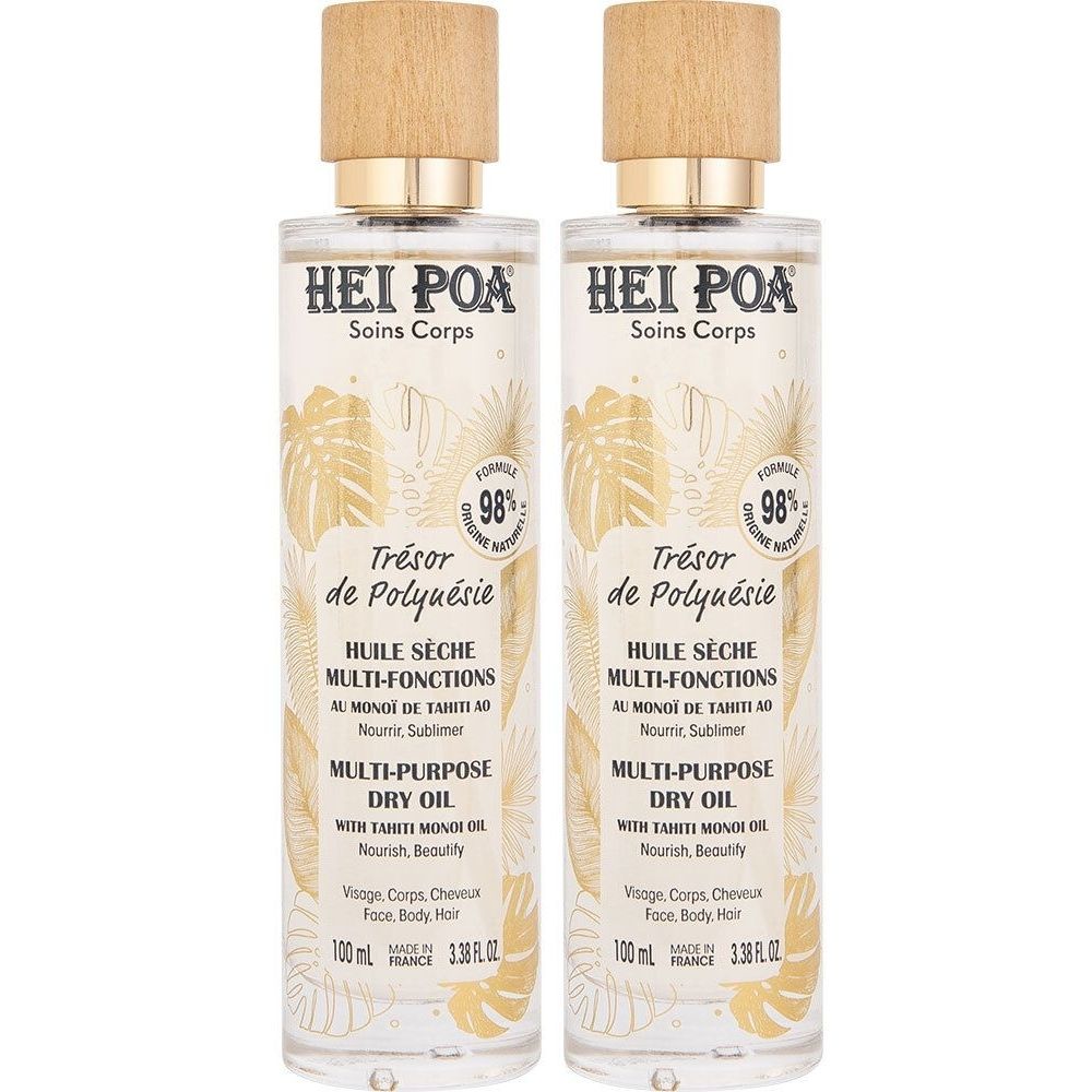 Twee flessen droge olie. Opschrift: HEI POA, Trésor de Polynésie, Multi-Purpose Dry Oil. Houten doppen, gouden tekst.