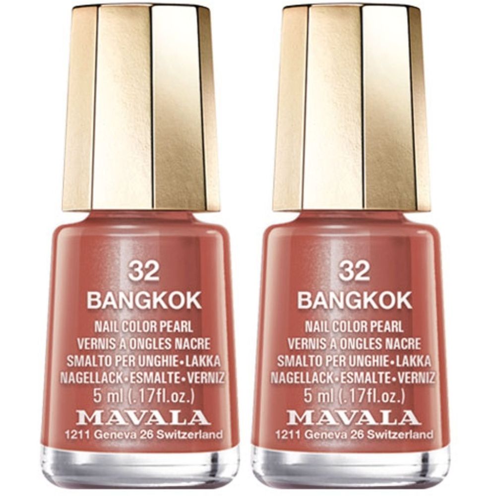 Deux flacons de vernis à ongles corail. Inscription: 32 BANGKOK, MAVALA. Bouchon doré. 5 ml.