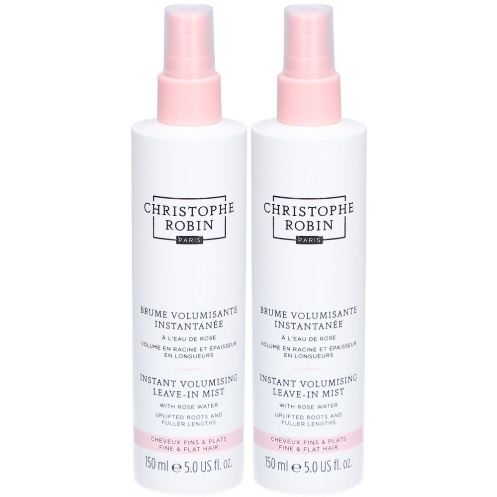 Twee witte spuitflessen met roze doppen. Opschrift: CHRISTOPHE ROBIN PARIS. Tekst: Brume Volumisant Instantanée, Instant Volumising Leave-in Mist.