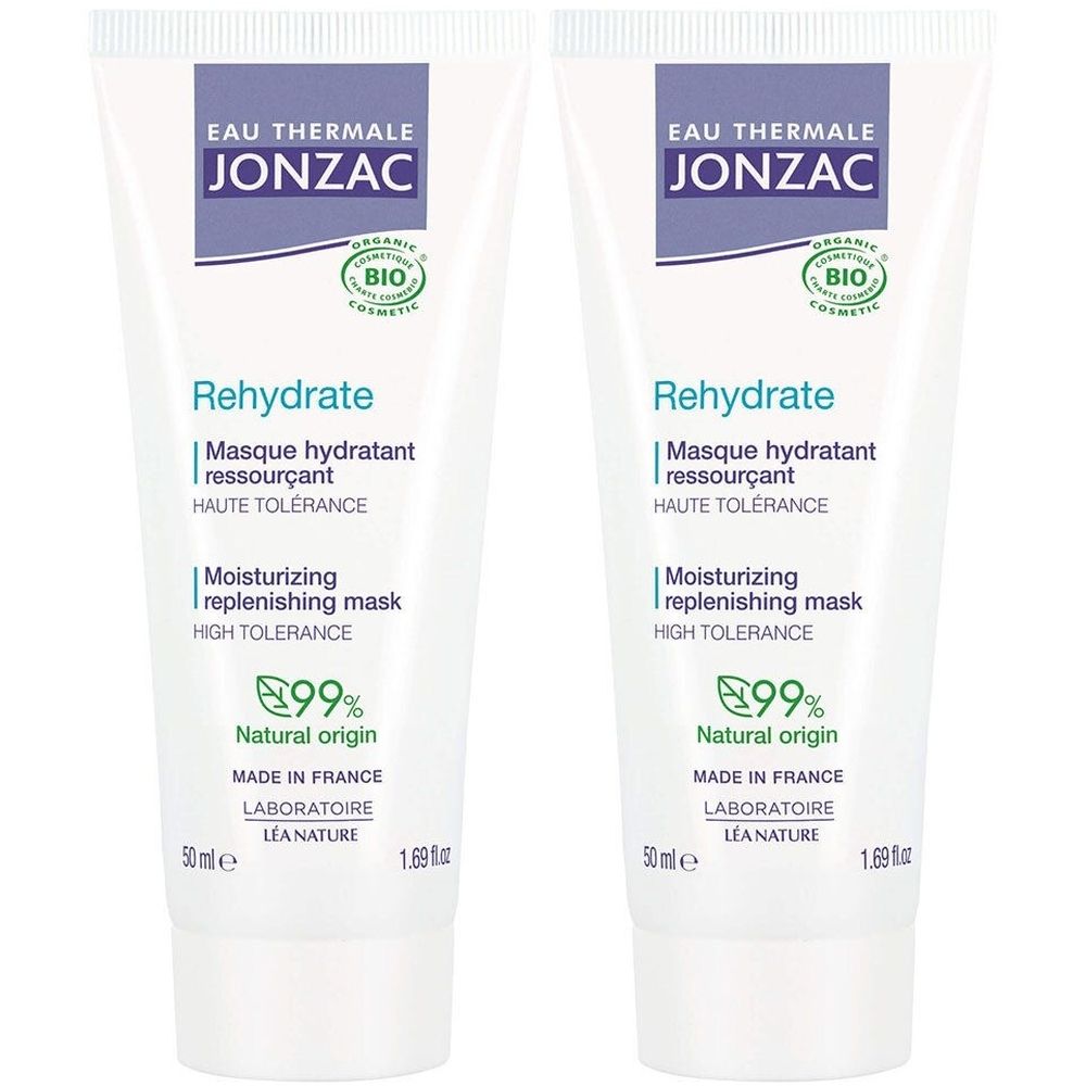 Twee witte tubes. Opschrift: Eau Thermale Jonzac, Rehydrate, Masque hydratant ressourçant, 99% Natural origin. Bio logo.