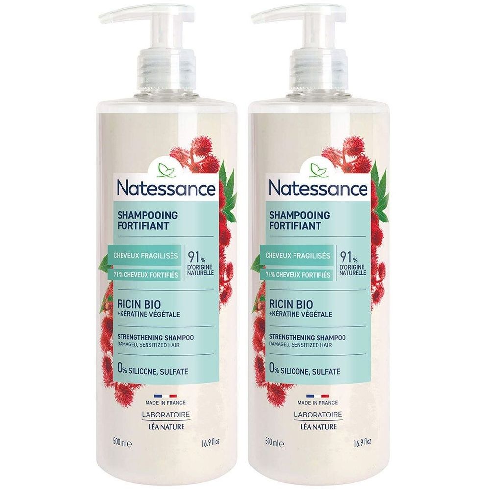 Twee shampoo flessen met pomp. Opschrift: Natessance, Shampooing Fortifiant, Ricin Bio, 0% siliconen, sulfaat.