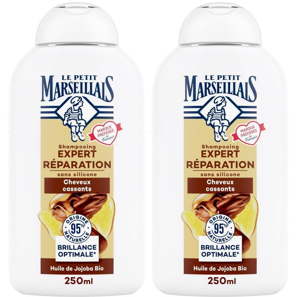 Twee shampoo flessen. Opschrift: Le Petit Marseillais, Expert Réparation, Huile de Jojoba Bio. 250ml.