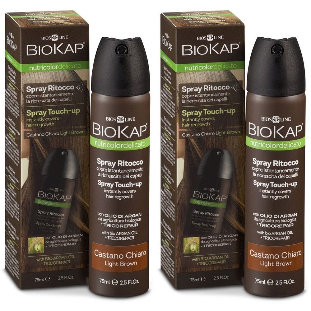 Twee sprays en verpakkingen van BIOKAP. Opschrift: Spray Ritocco, Castano Chiaro, Light Brown. Met arganolie.