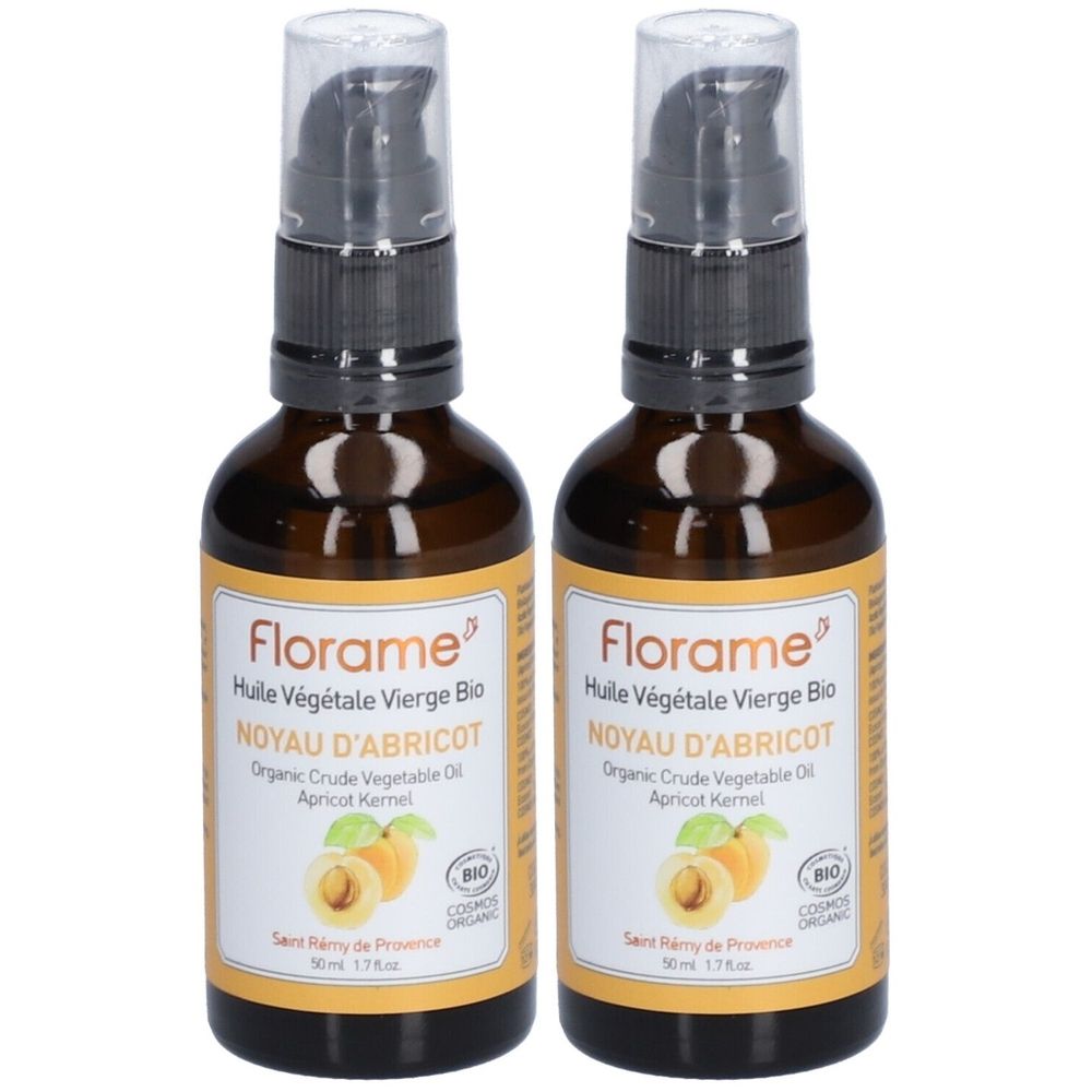 Deux flacons en verre brun avec pompe. Étiquette avec nom du produit, illustration d'abricots et label bio. Texte: Florame, Noyau d'Abricot, Huile Végétale Vierge Bio.
