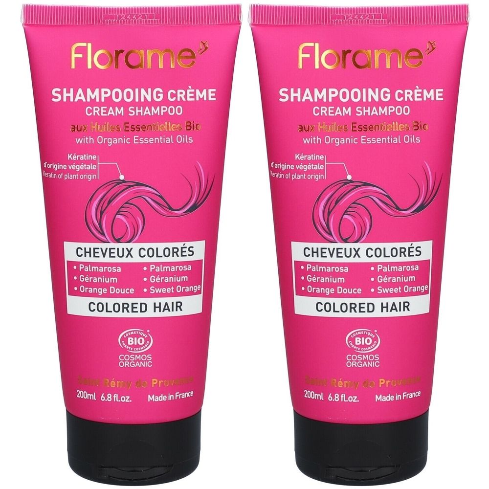 Twee roze tubes shampoo met zwarte dop. Opschrift: Florame, Shampooing Crème, voor gekleurd haar. Bio-certificering.