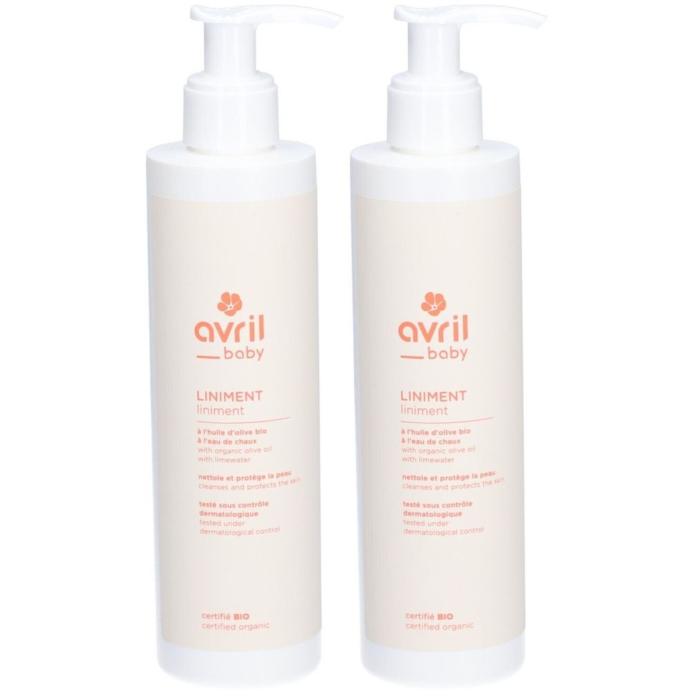Twee crème flessen met pomp. Opschrift: avril baby, Liniment. Gecertificeerd biologisch.