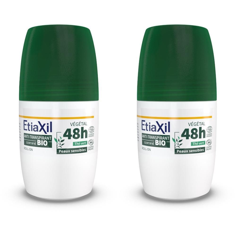 Twee roll-on deodorants met groene doppen. Opschrift: Etiaxil, 48h, BIO-certificering.