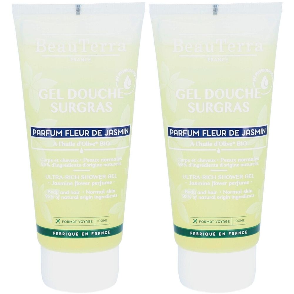 Twee tubes douchegel. Opschrift: GEL DOUCHE SURGRAS, PARFUM FLEUR DE JASMIN. Witte dop, groene accenten.
