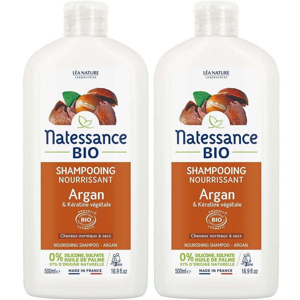 Twee witte shampoo flessen met bruine en groene etiketten. Opschrift: Natessance BIO, Argan & plantaardige Keratine.