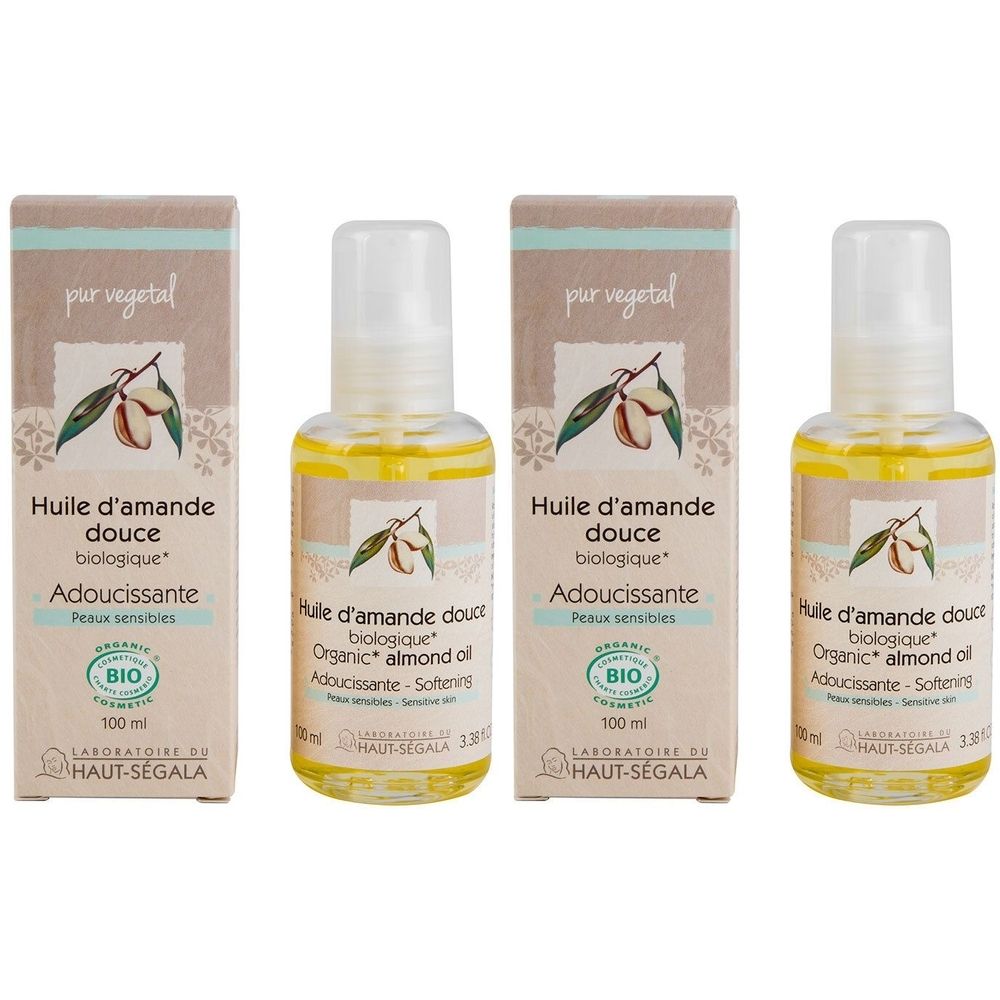 Drie flessen amandelolie met kartonnen verpakking. Opschrift: Huile d'amande douce biologique, Adoucissante, BIO-certificering.