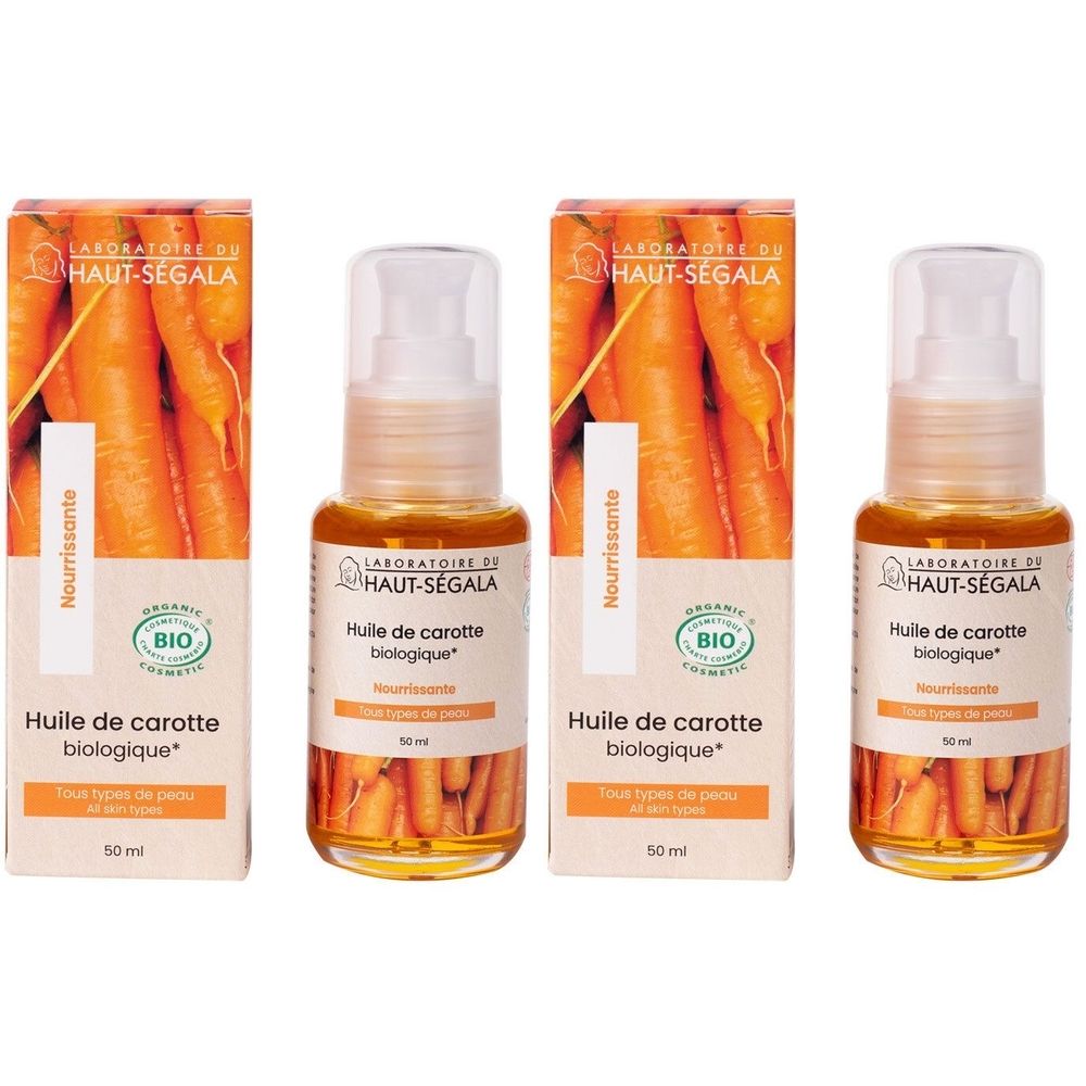 Drie flessen en verpakkingen. Opschrift: Huile de carotte biologique. Bio-certificering. Oranje olie met pomp.