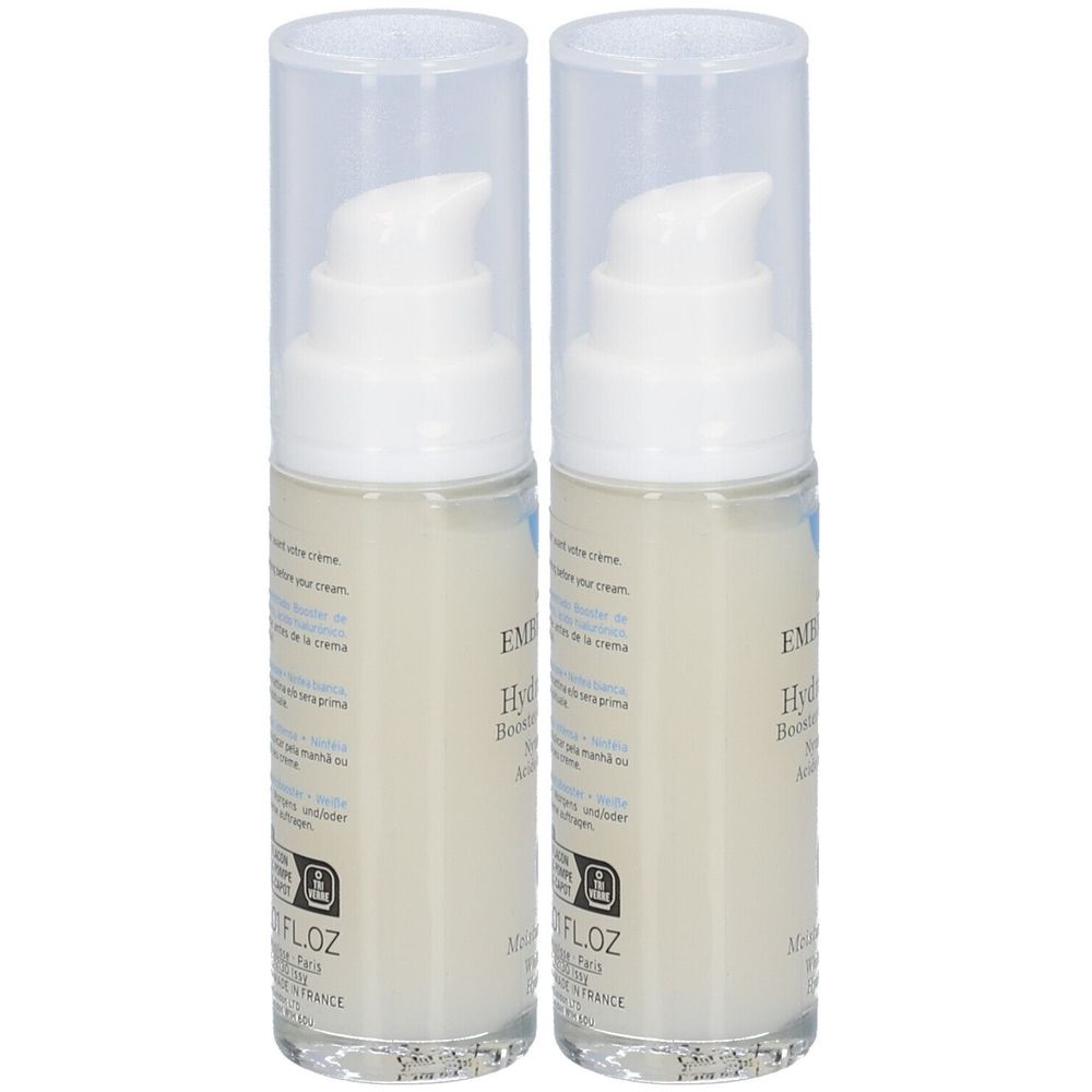 Deux flacons avec pompe blanche et bouchon transparent. Inscription: EMBRYOLISSE Hydra-Sérum.