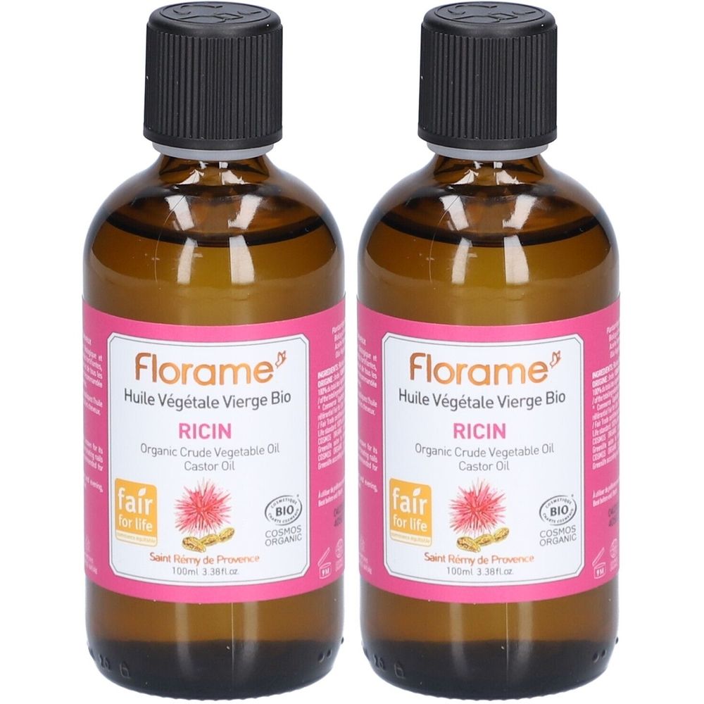 Twee bruine glazen flessen met zwarte dop en roze etiket. Opschrift: Florame, Ricin, bio-certificering.