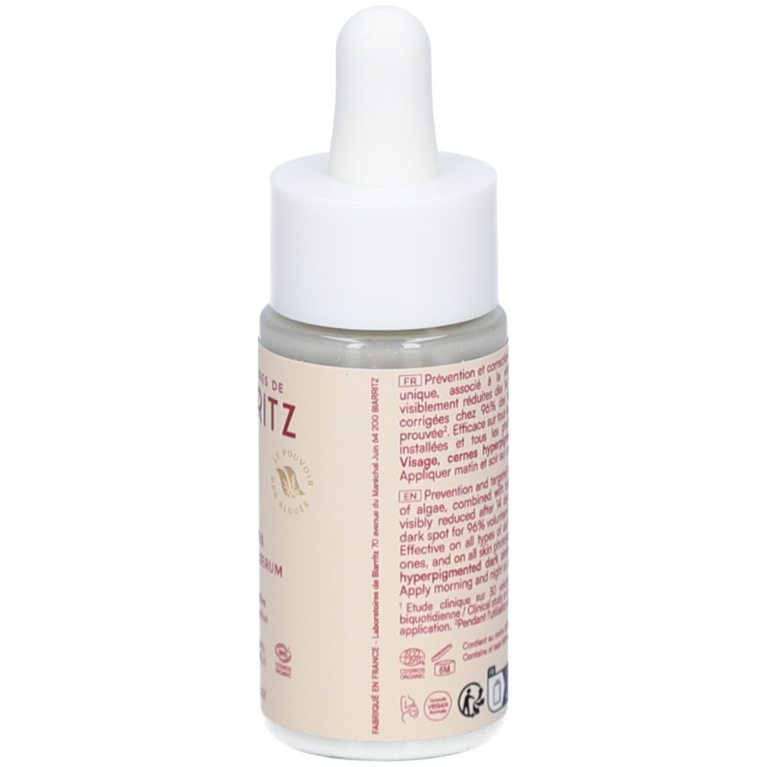 Achteraanzicht van de fles. Franse tekst. Fles met witte dop en pipet. Logo en certificeringen.