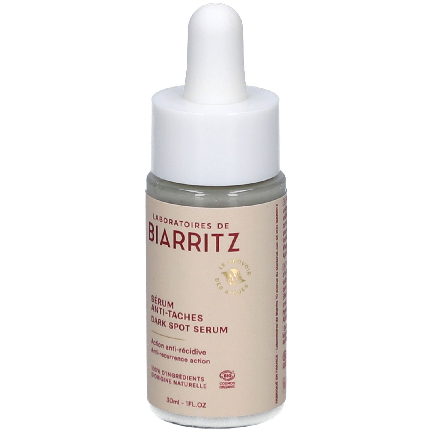 Beige fles met witte dop en pipet. Opschrift: LABORATOIRES DE BIARRITZ, Sérum Anti-Tâches, Dark Spot Serum.
