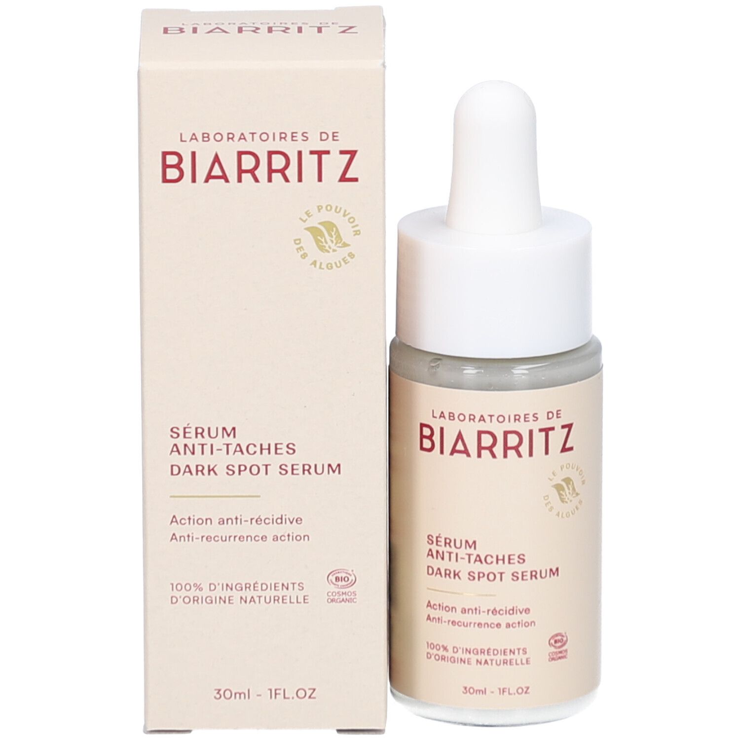 Productverpakking en fles. Opschrift: LABORATOIRES DE BIARRITZ, Sérum Anti-Tâches, Dark Spot Serum. Beige en wit.