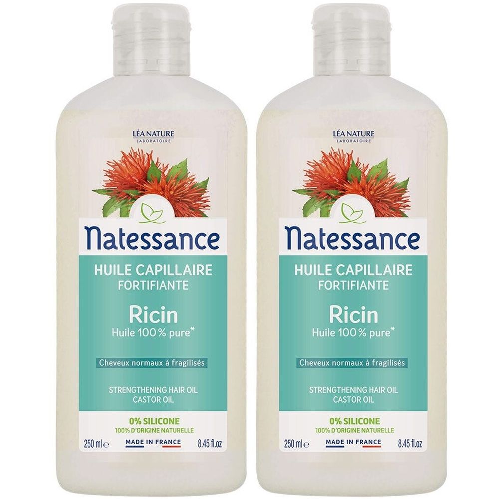 Twee flessen NATESSANCE Huile de ricin. Witte flessen met turquoise etiketten. Tekst: Ricin, Huile 100% pure. Made in France.