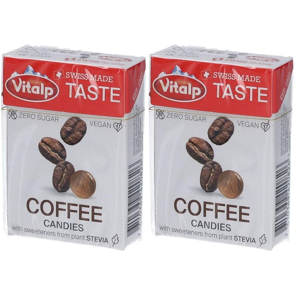 Deux boîtes de bonbons au café Vitalp. Emballage rouge et blanc avec image de grains de café. Inscription : Zero Sugar, Vegan.