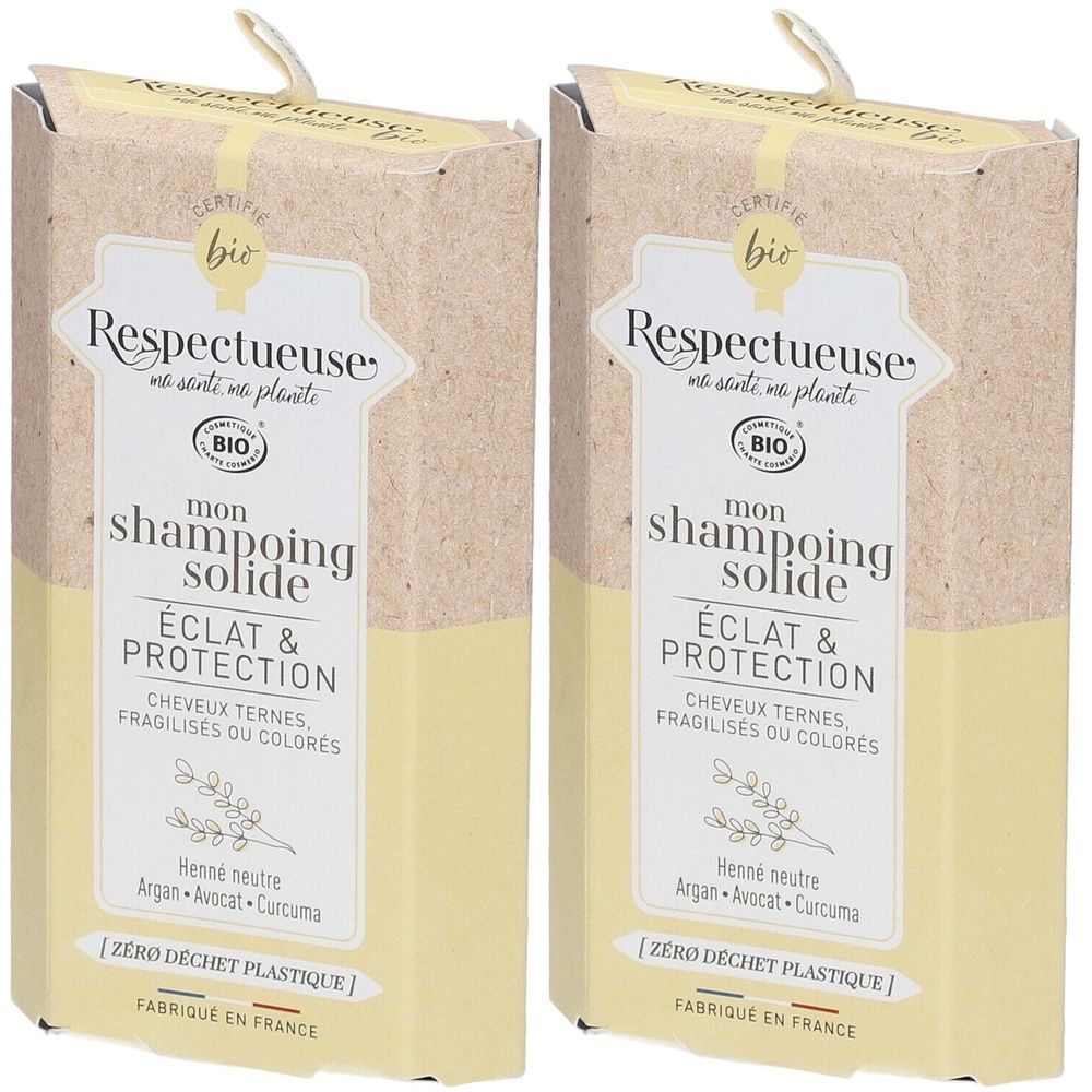 Deux boîtes rectangulaires avec informations produit. Inscription: Respectueuse, Mon Shampoing Solide, Éclat & Protection. Certification Bio.