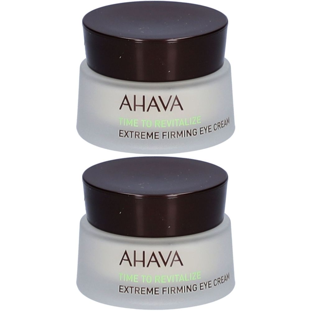 Deux pots de crème pour les yeux, verre blanc, couvercle marron. Inscription : AHAVA, Time to Revitalize, Extreme Firming Eye Cream.