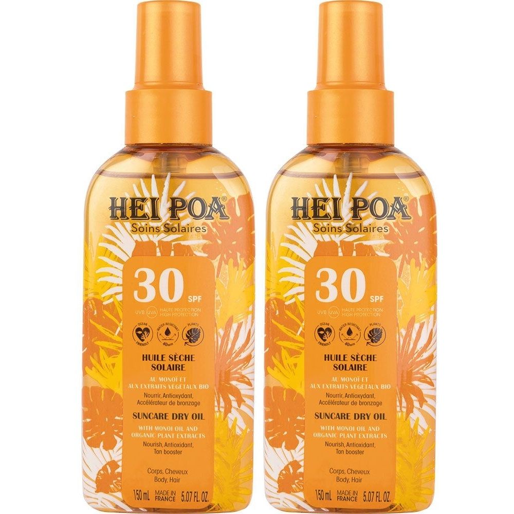 Twee flessen HEI POA zonnebrand droge olie SPF30. Oranje sproeikoppen, transparante flessen met geel-oranje inhoud en etiket.