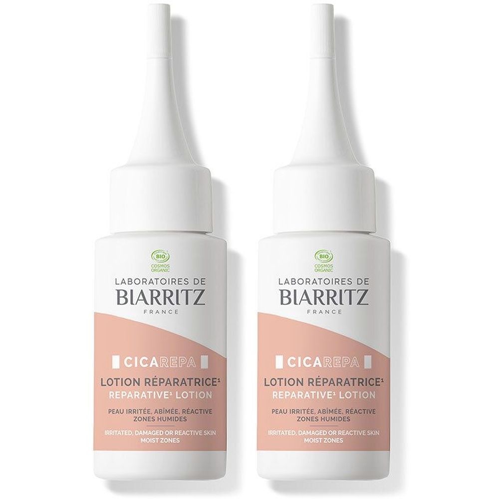 Twee witte flacons met applicator. Opschrift: Laboratoires de Biarritz, CicaRepa, Lotion Réparatrice.
