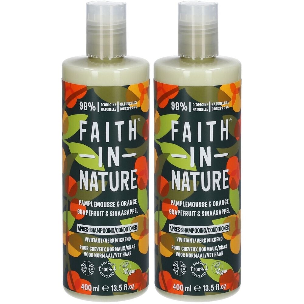 Twee flessen conditioner. Opschrift: FAITH IN NATURE, Grapefruit & Sinaasappel. 400 ml. 99% natuurlijke ingrediënten. Voor normaal/vet haar.