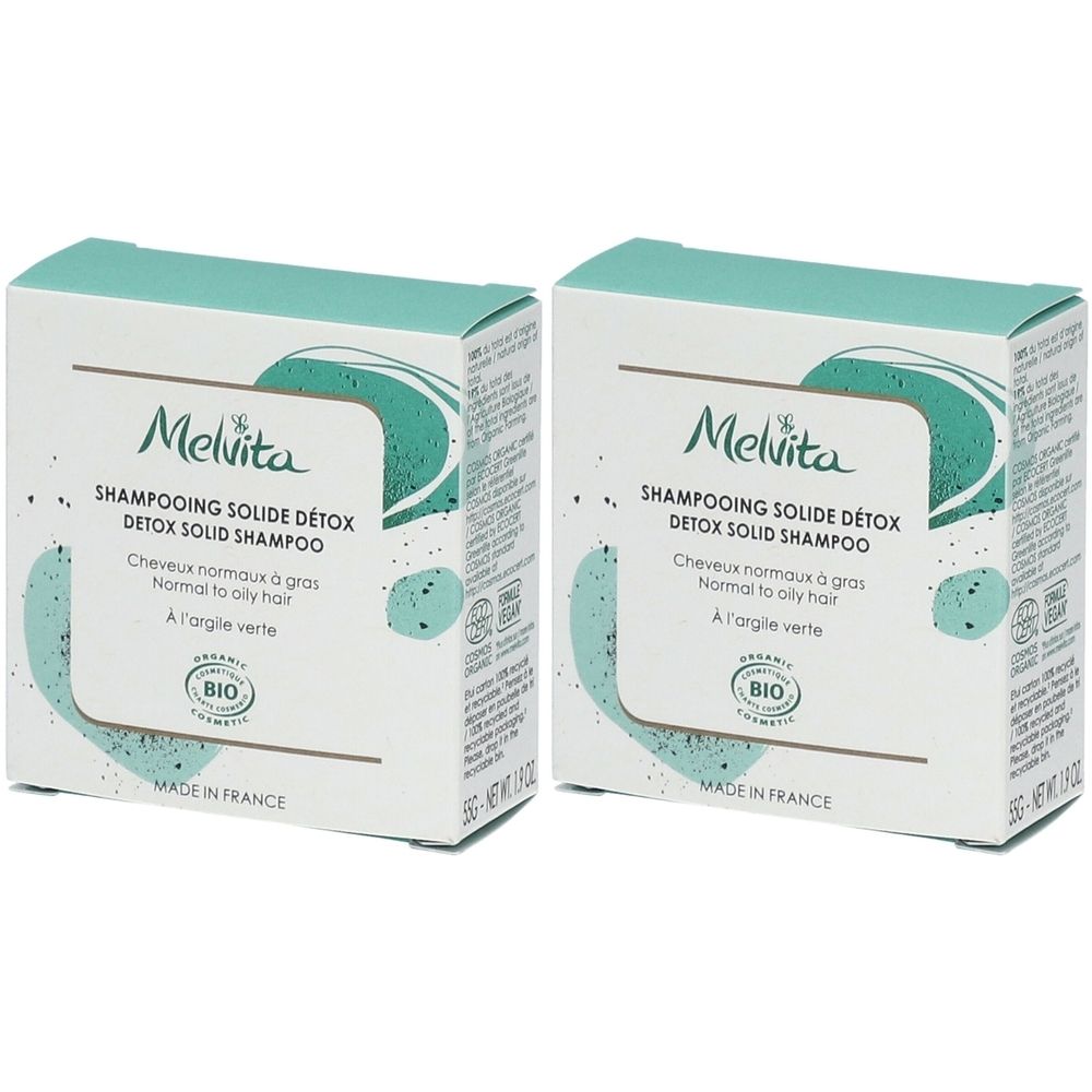 Deux boîtes carrées. Inscription : Melvita, Shampoing Solide Détox, pour cheveux normaux à gras. Certification bio. Fabriqué en France.