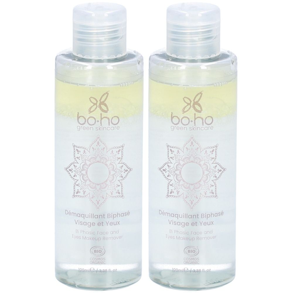 Deux flacons transparents avec bouchons blancs. Inscription: bo-ho green skincare, Démaquillant Biphase Visage et Yeux. Certification bio.