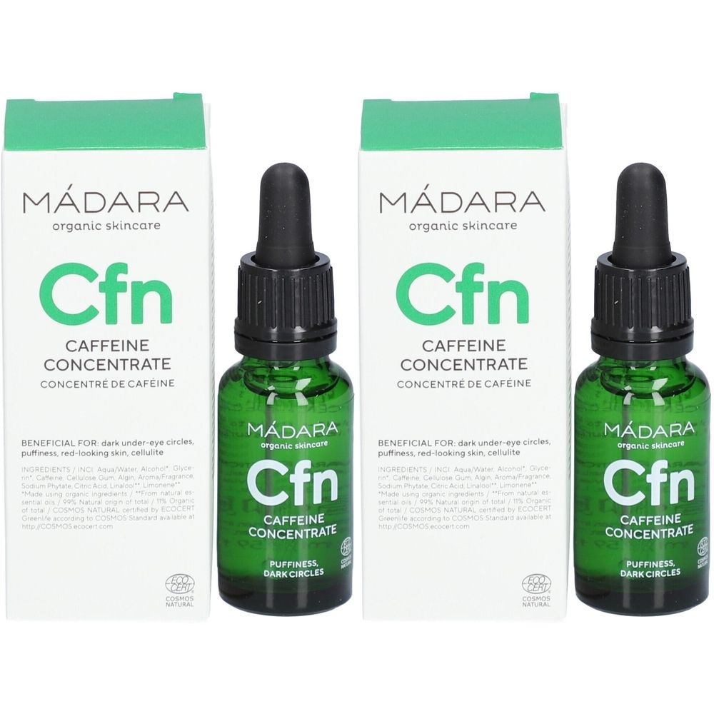 Twee groene glazen flessen met zwarte pipet en twee dozen. Op de flessen en dozen staat « Mádara Cfn Caffeine Concentrate ».