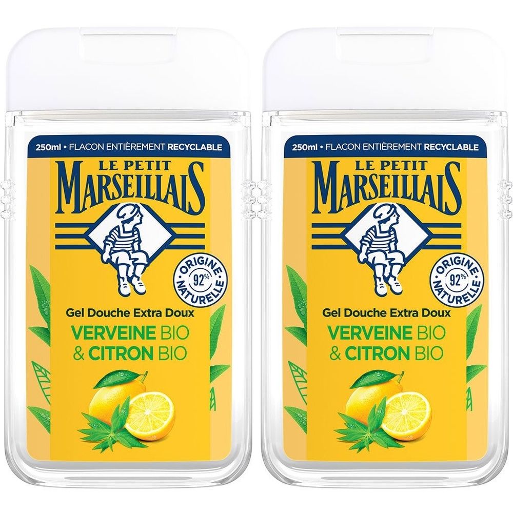 Twee transparante flacons met geel etiket. Opschrift: Le Petit Marseillais, Gel Douche Extra Doux Verveine & Citron Bio. Afbeelding van citroen.