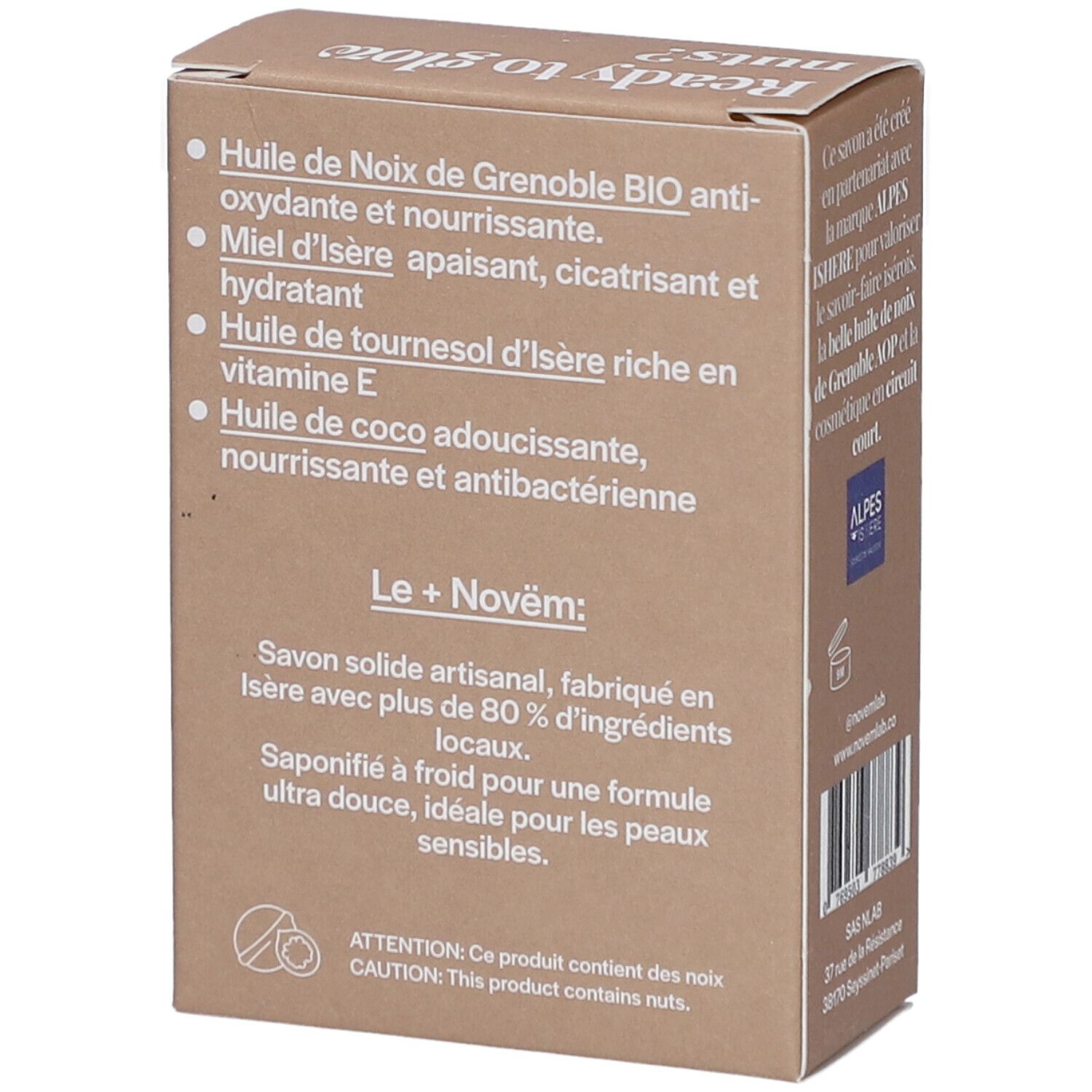 Bruine kartonnen verpakking met ingrediënten en productinformatie. Opschrift: Huile de Noix de Grenoble BIO, Miel d'Isère, Huile de tournesol, Huile de coco.