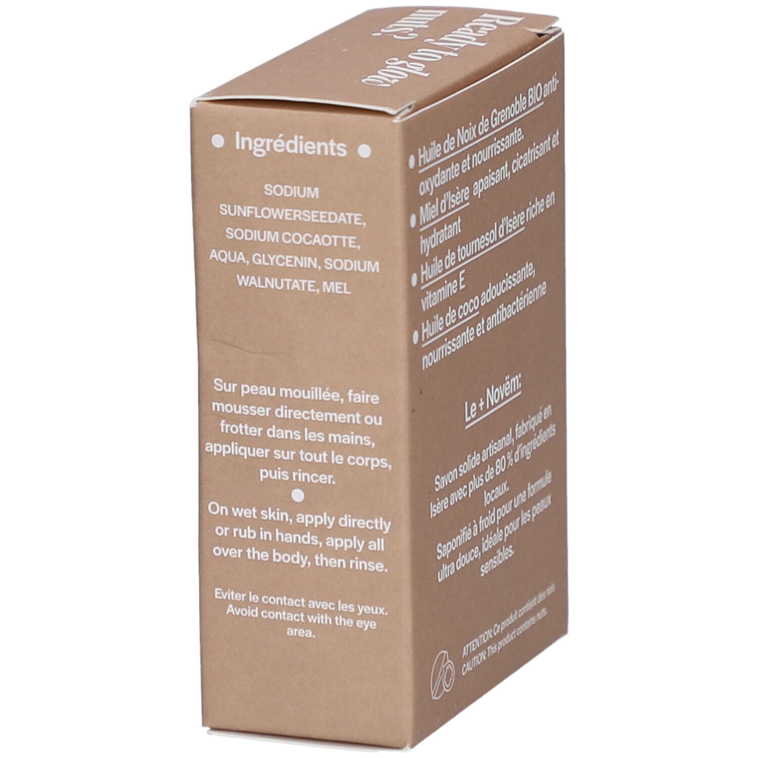 Bruine kartonnen verpakking met ingrediënten en gebruiksaanwijzing. Opschrift: Ingredients, Sodium, Aqua, Glycerin, Sodium Walnutate, Mel.