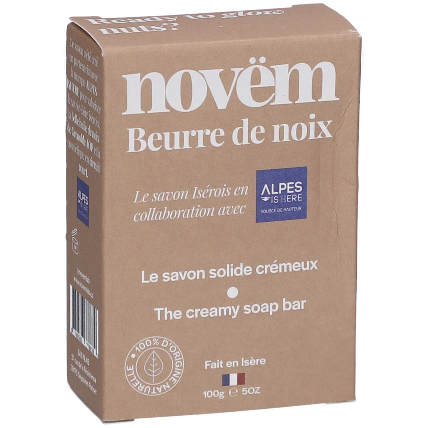 Bruine kartonnen verpakking met productinformatie. Opschrift: novëm, Beurre de noix, Le savon solide crémeux, The creamy soap bar. Met logo en certificering.