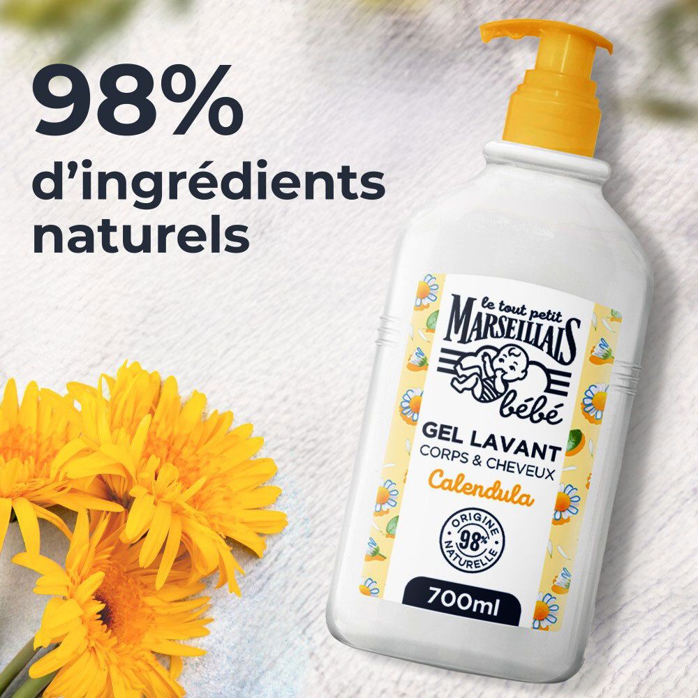 Witte dispenser met gele pomp. Tekst: 98% natuurlijke ingrediënten. Gele bloemen.