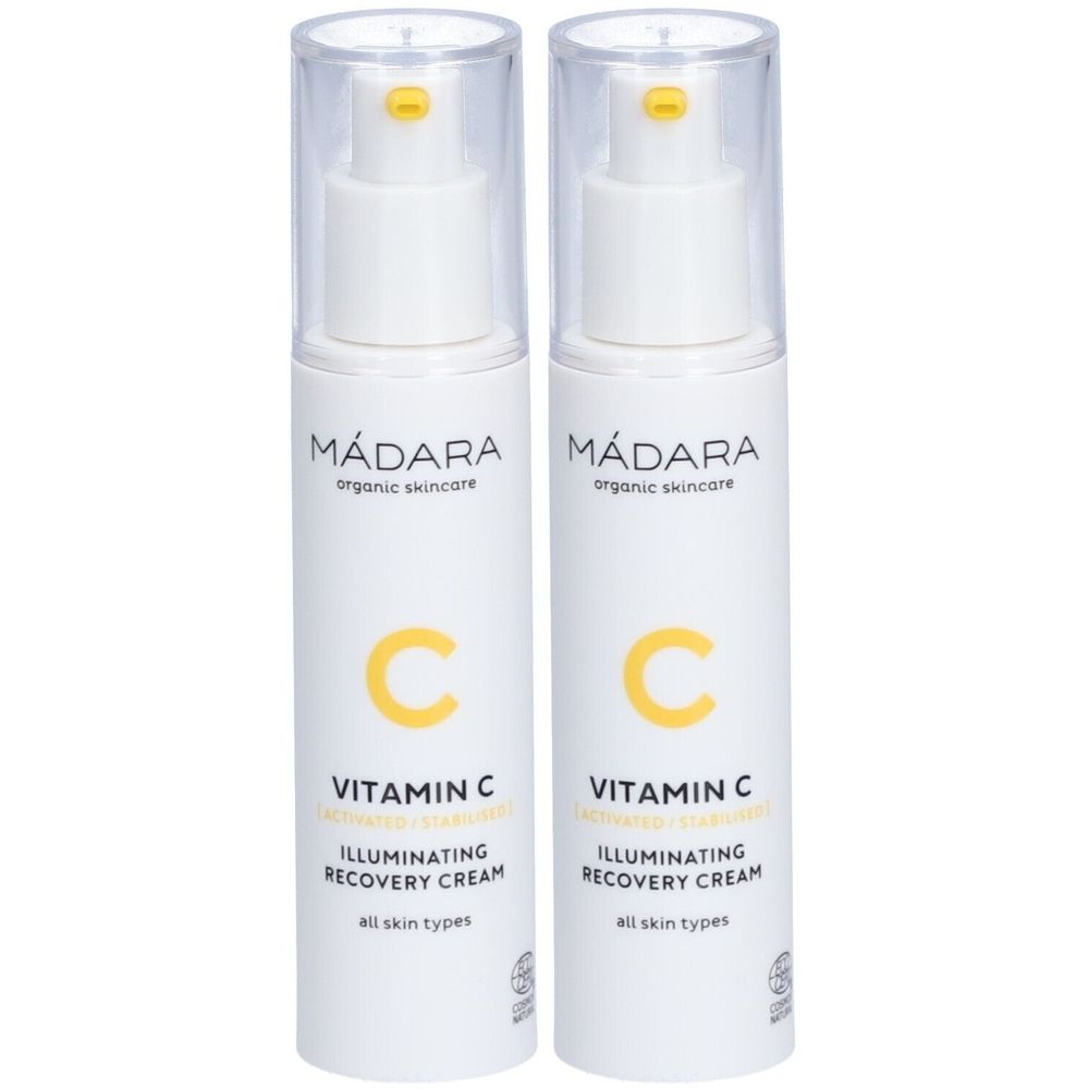 Twee witte flessen met gele accenten. Opschrift: Mádara, Vitamin C, Illuminating Recovery Cream. Voor alle huidtypen.