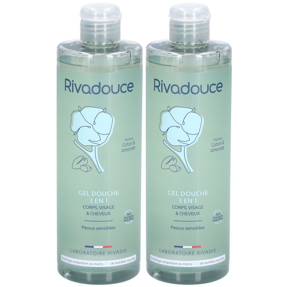 Deux flacons de gel douche Rivadouce 3 en 1 Coton & Amande. Étiquette avec motif floral et informations produit.