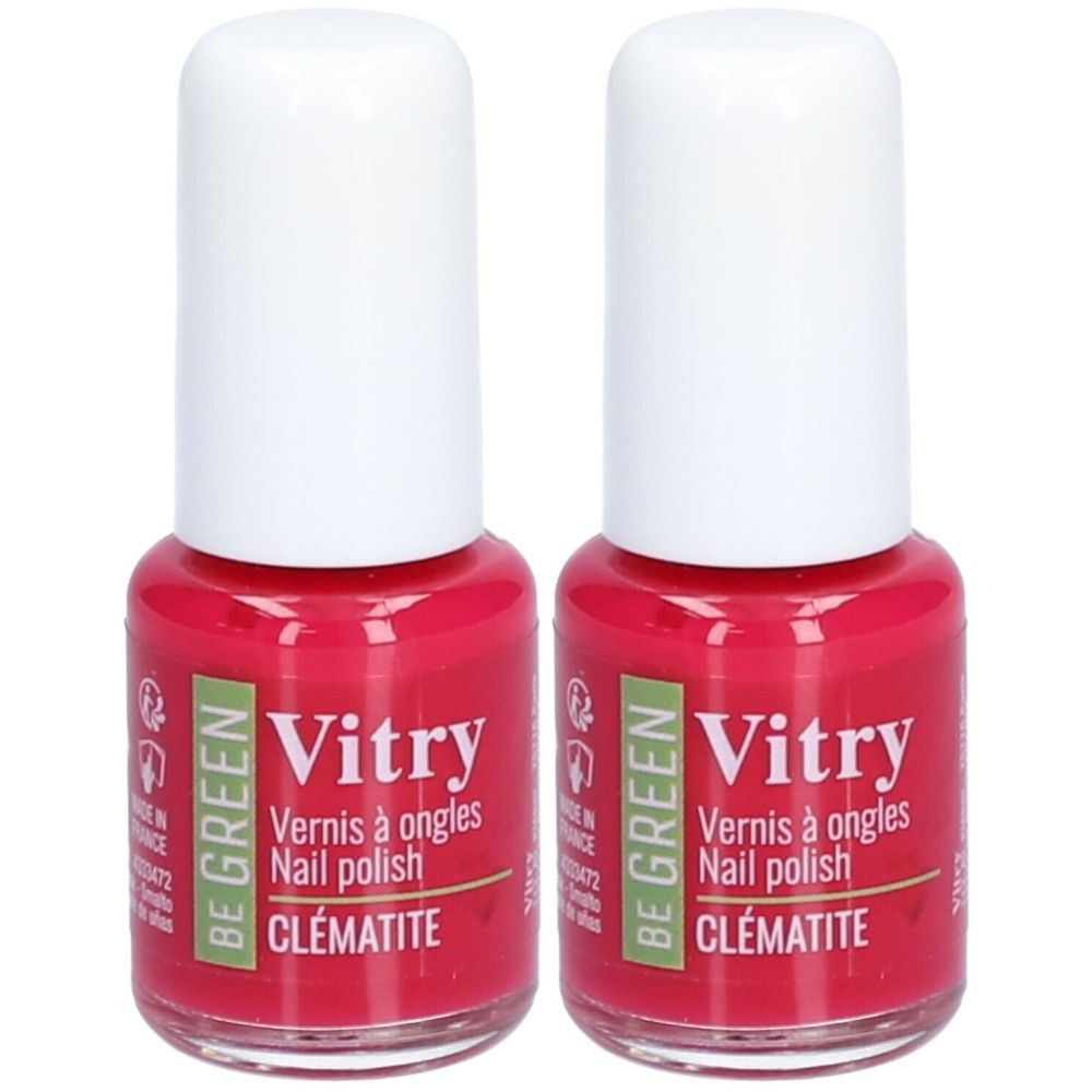 Twee flessen nagellak. Rode vloeistof in glazen flessen met witte doppen. Opschrift: Vitry, Vernis à ongles, Nail polish, CLÉMATITE.