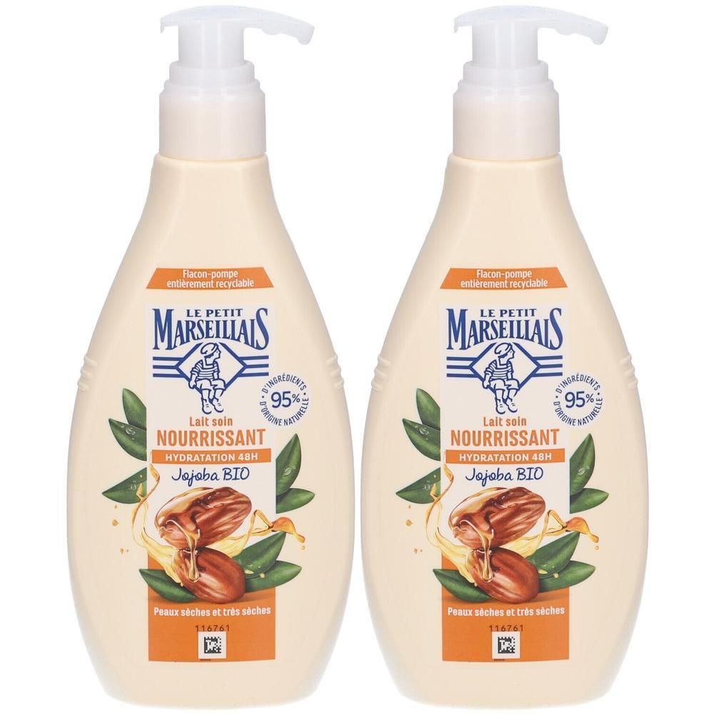 Twee flessen LE PETIT MARSEILLAIS Nourrissant bodylotion. Beige flessen met pomp. Opschrift: Nourrissant, Jojoba BIO. 95% natuurlijke ingrediënten.