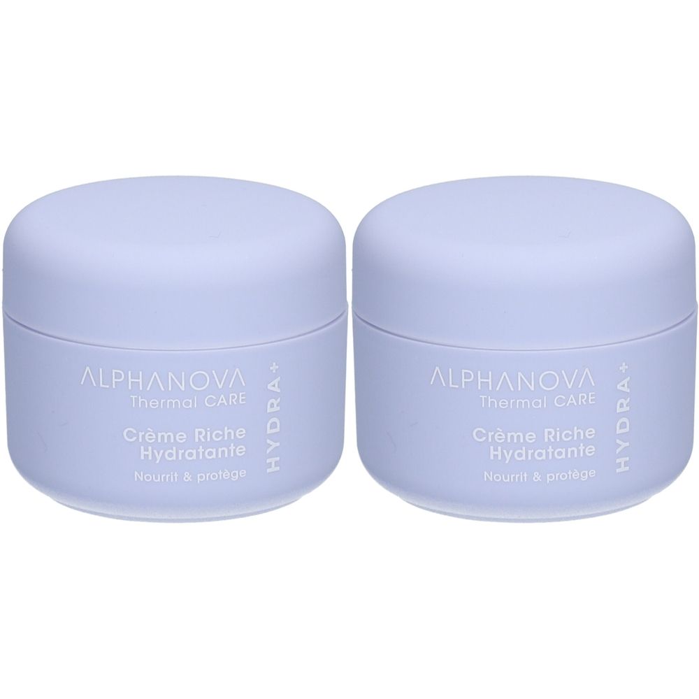 Twee blauwe crèmepotten met deksels. Opschrift: ALPHANOVA Thermal CARE Crème Riche Hydratante. Hydra+.